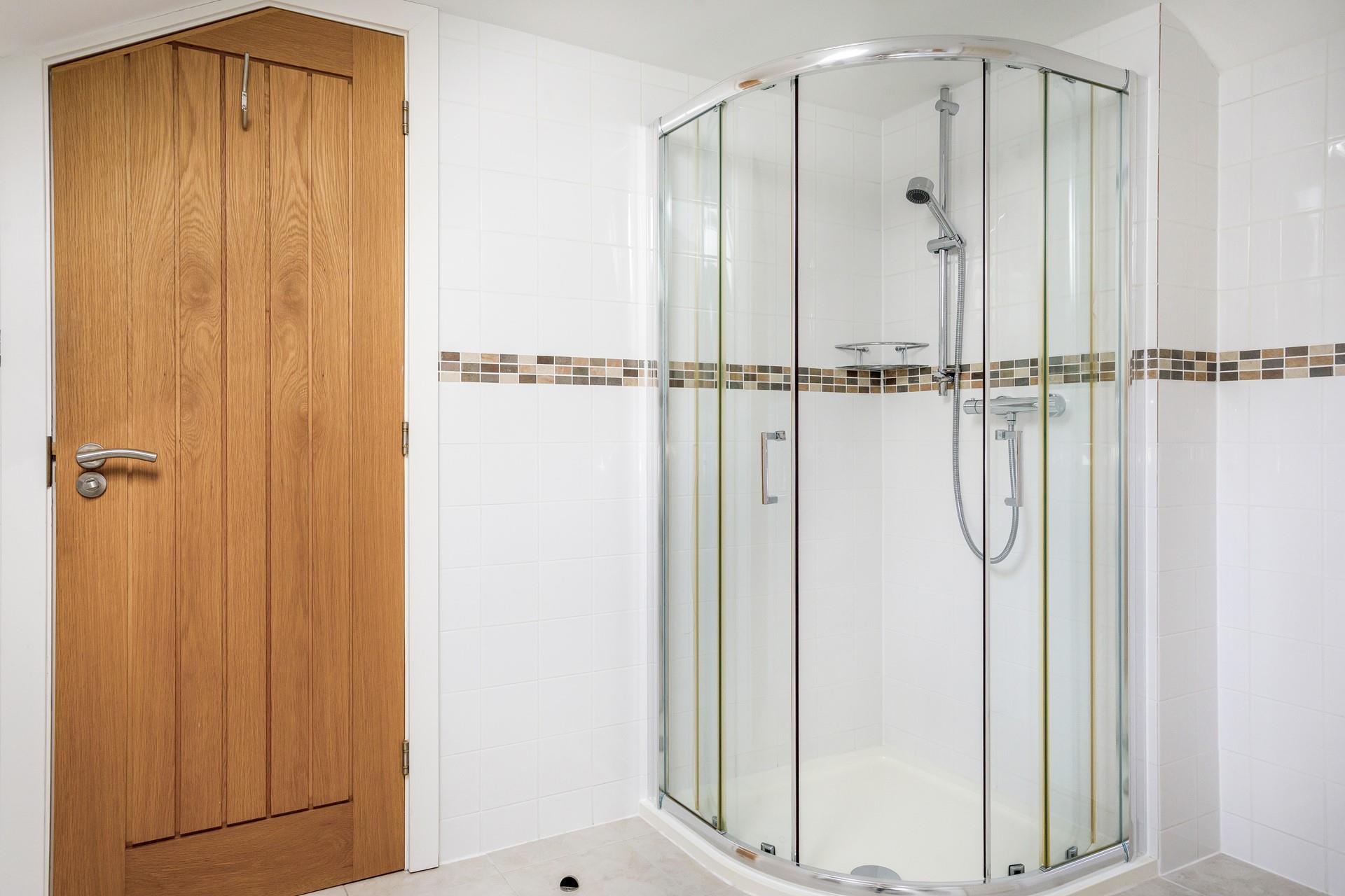 Wash off sandy toes in the shower after a day on the beach in St Mawes.