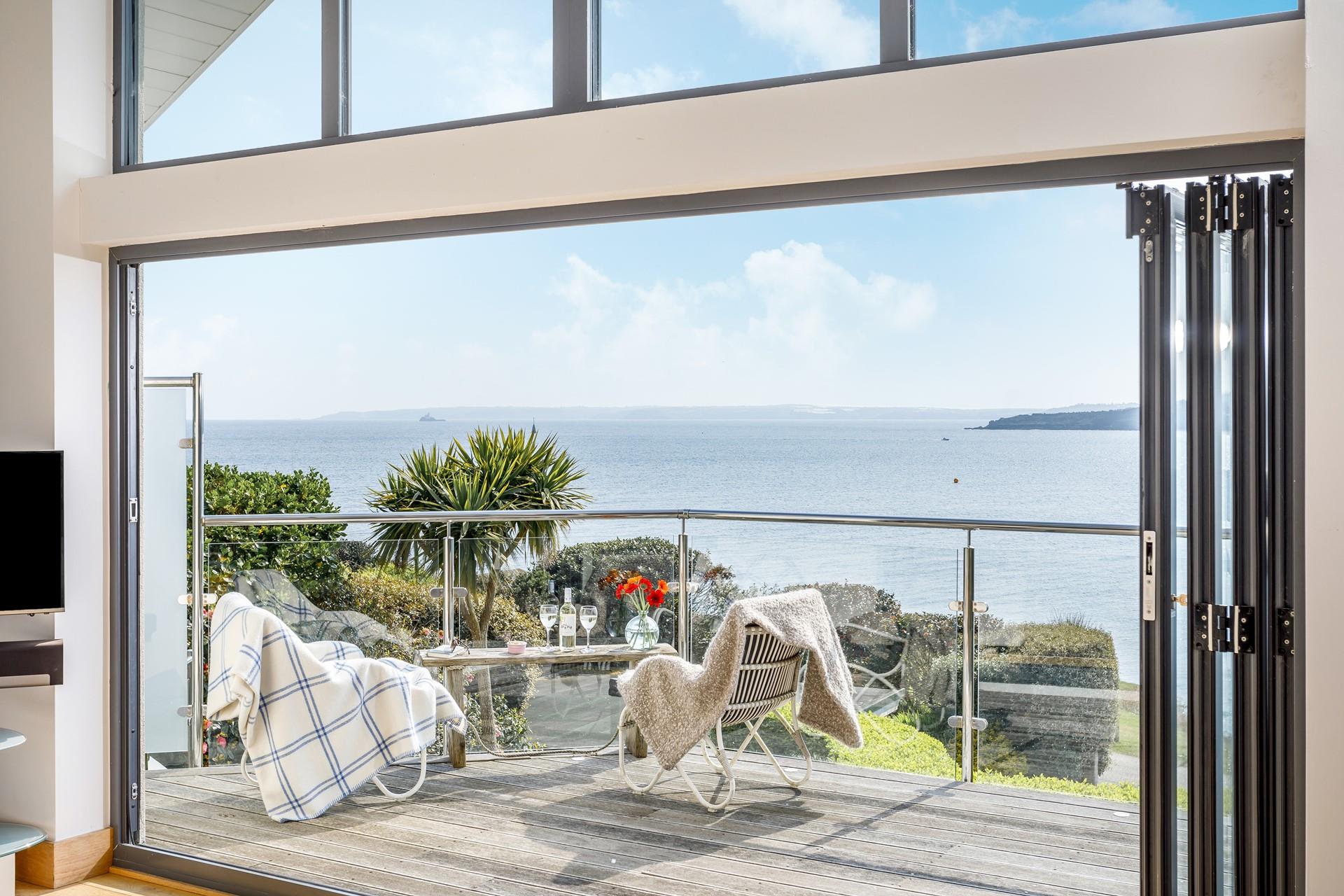 Watch the boats coming and going with a glass of wine and nibbles.