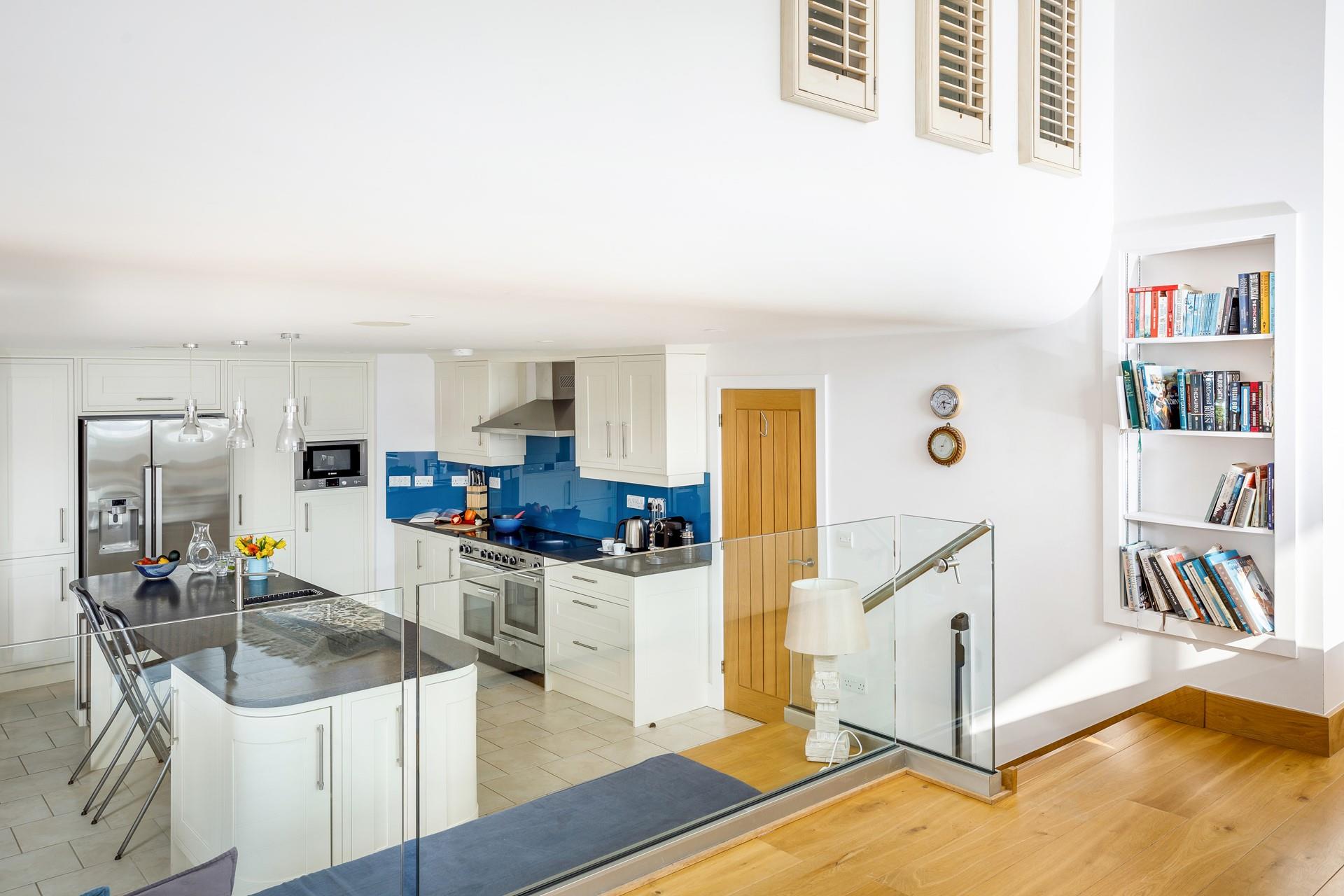 Relax in the living room as someone cooks you dinner.