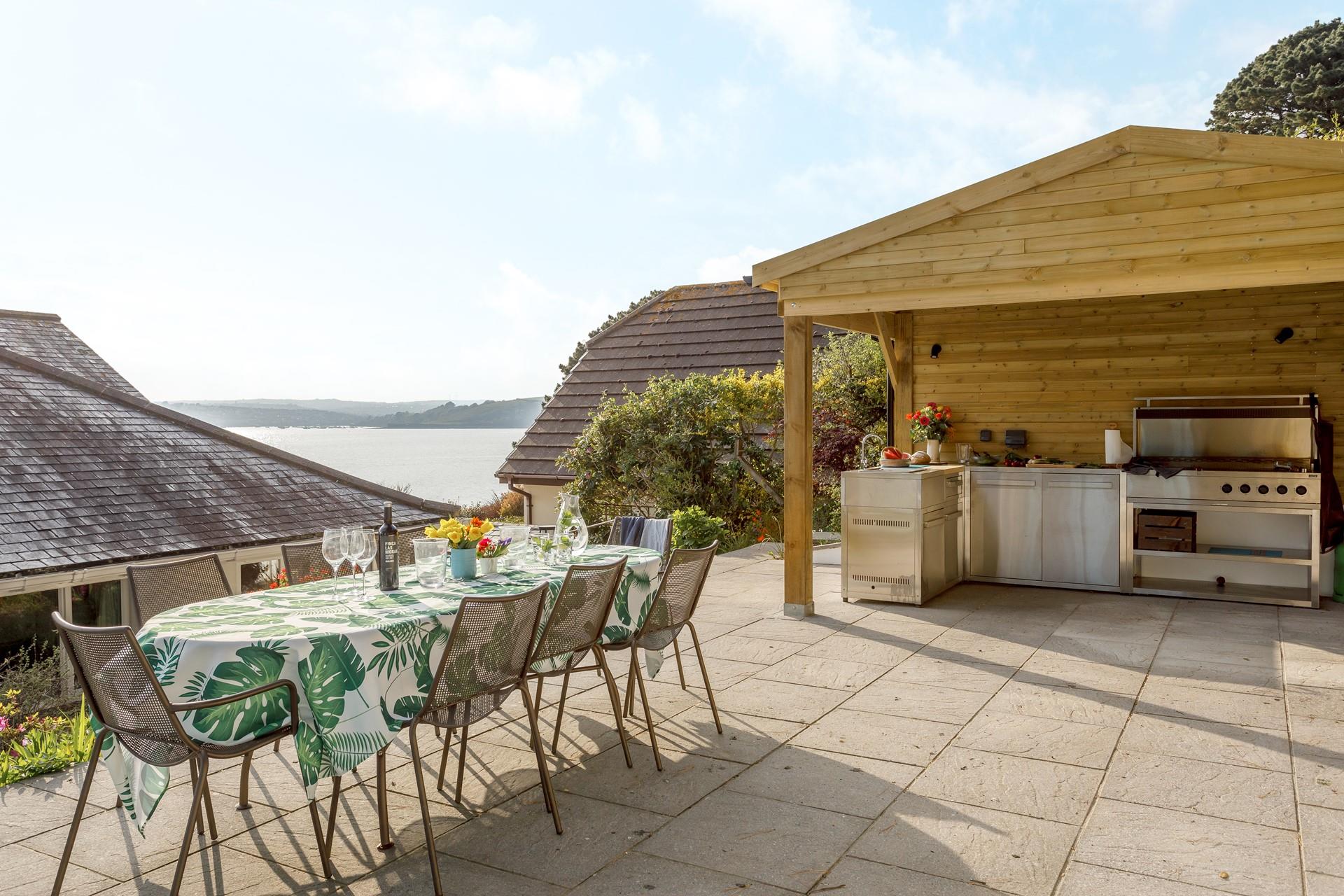 On balmy summer evenings, cook up a storm in the lovely outdoor kitchen.