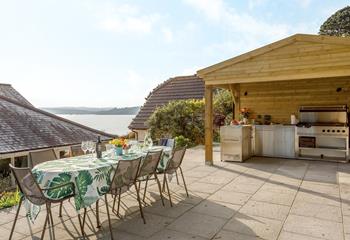 On balmy summer evenings, cook up a storm in the lovely outdoor kitchen.