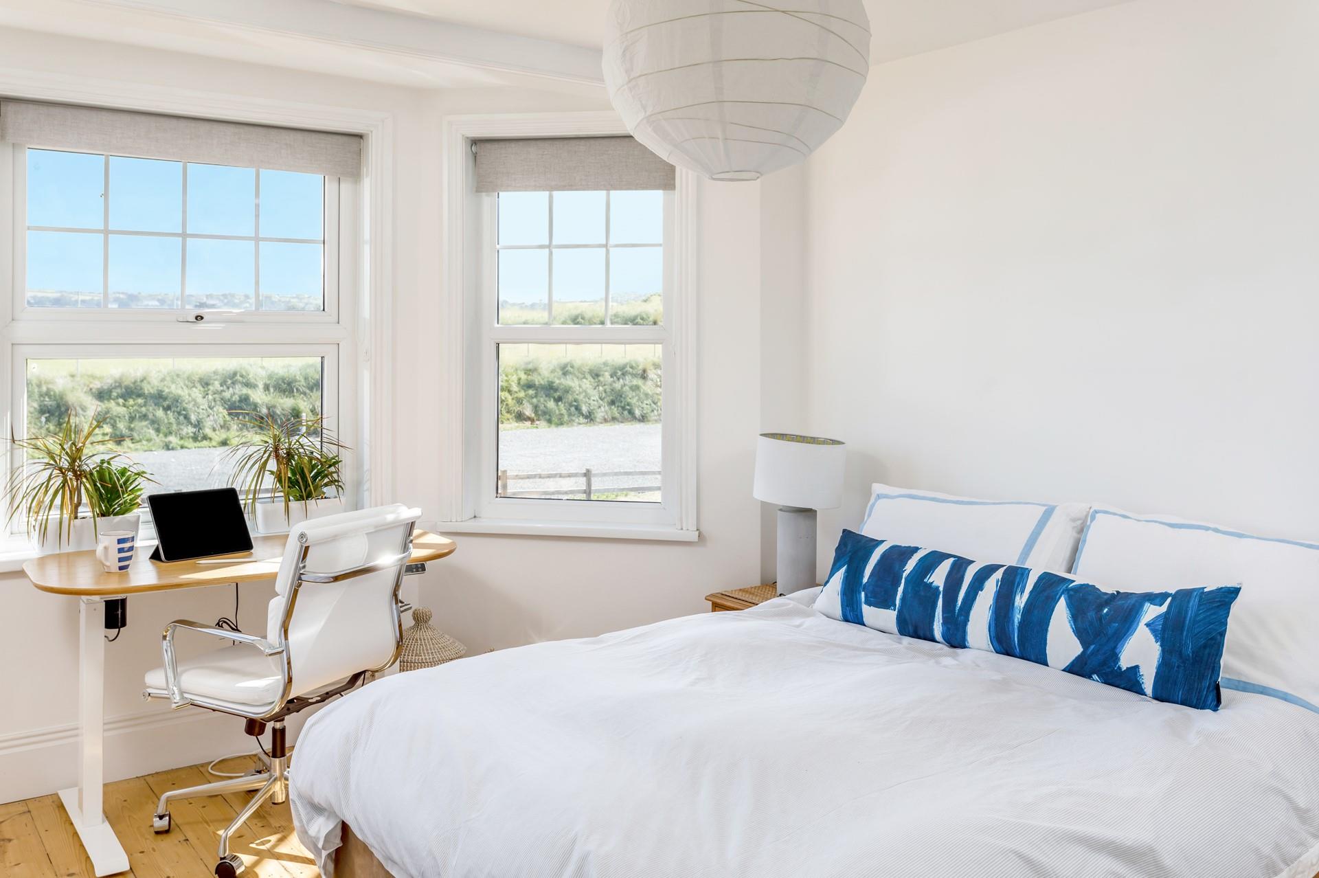 Bedroom 3 overlooks the golf course and has a spacious double bed to cosy into each evening.