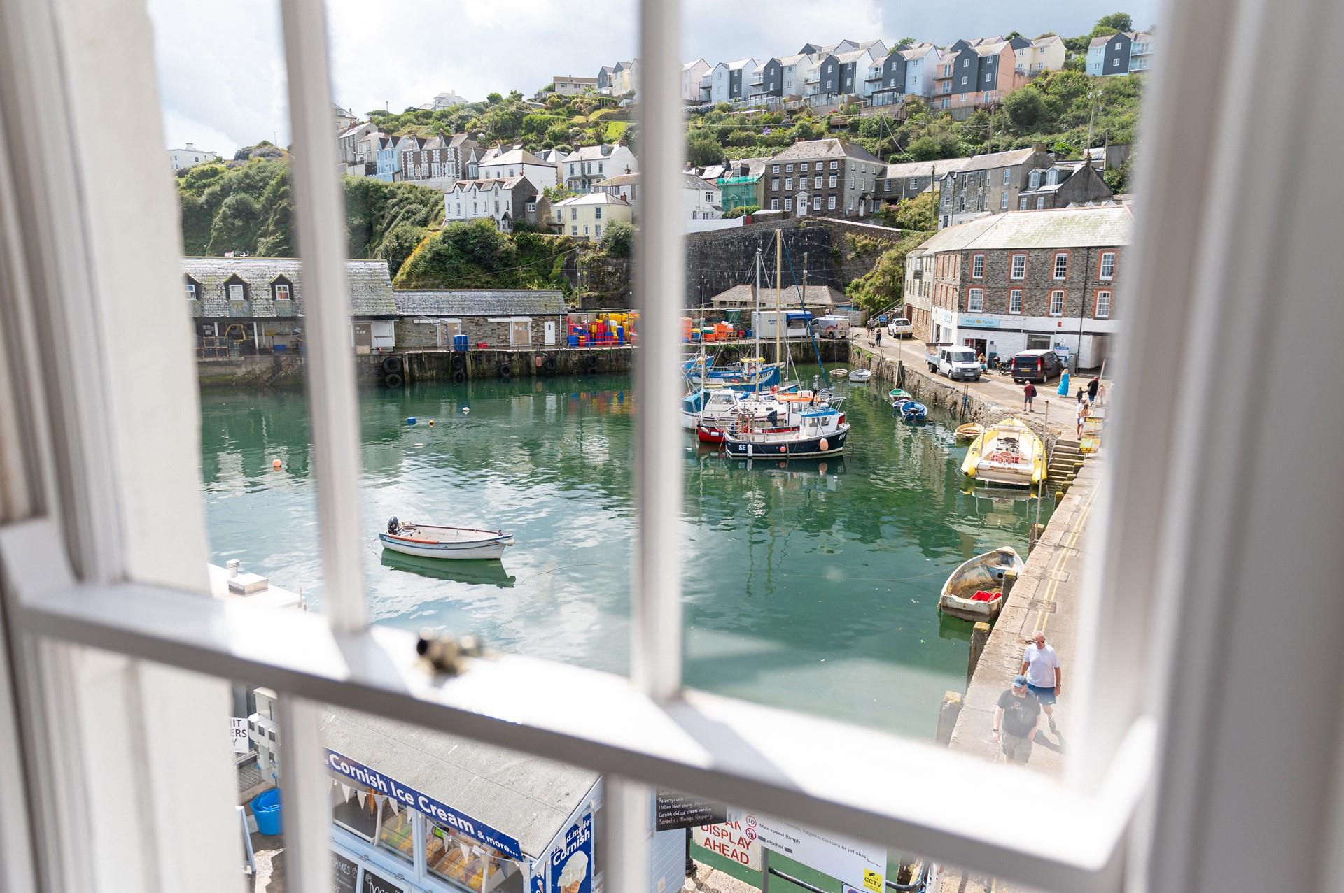 Wake up to views of the boats bobbing on the harbour.