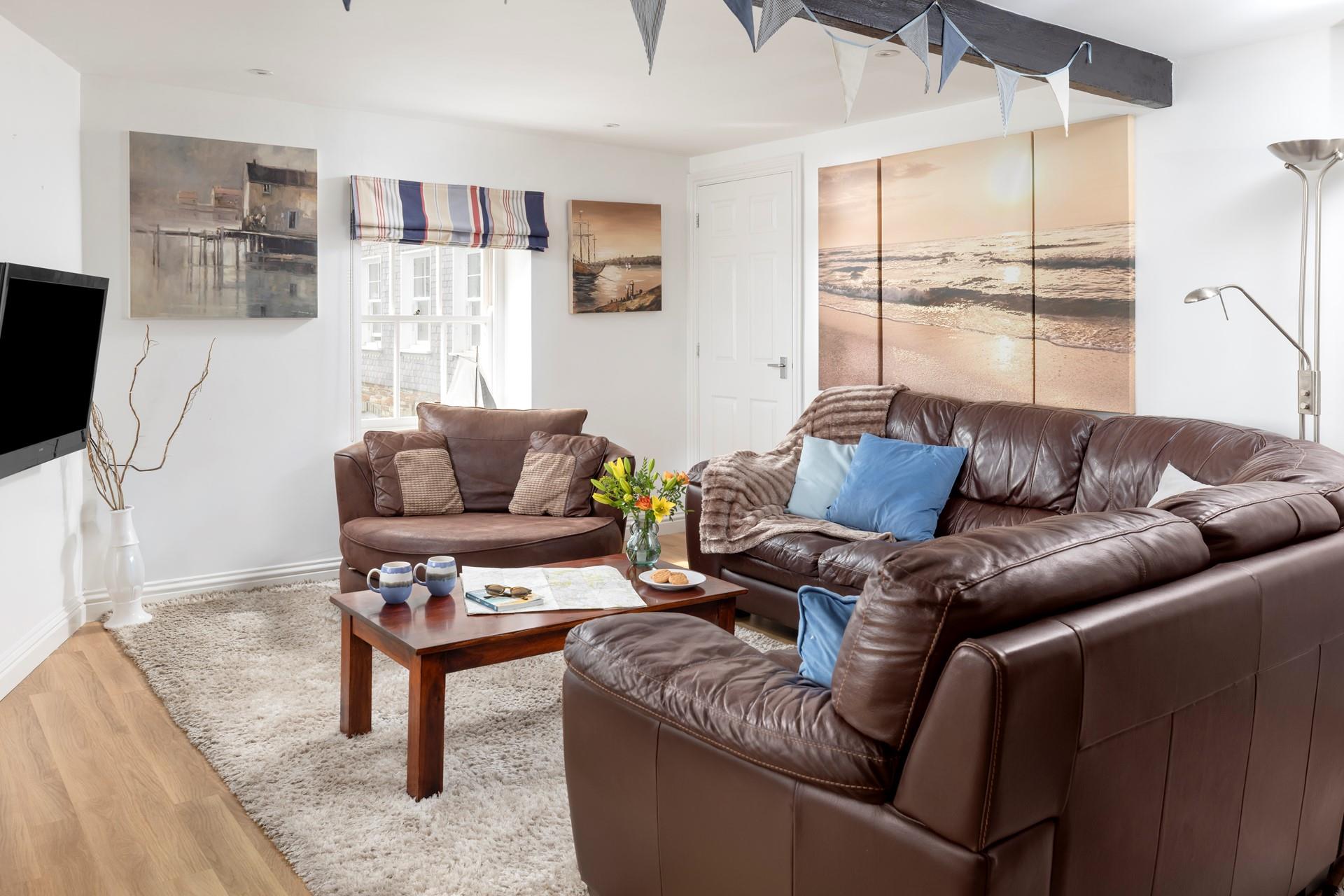 Sink into the leather sofa and put your favourite movie on the TV.