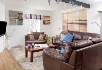 Sink into the leather sofa and put your favourite movie on the TV.