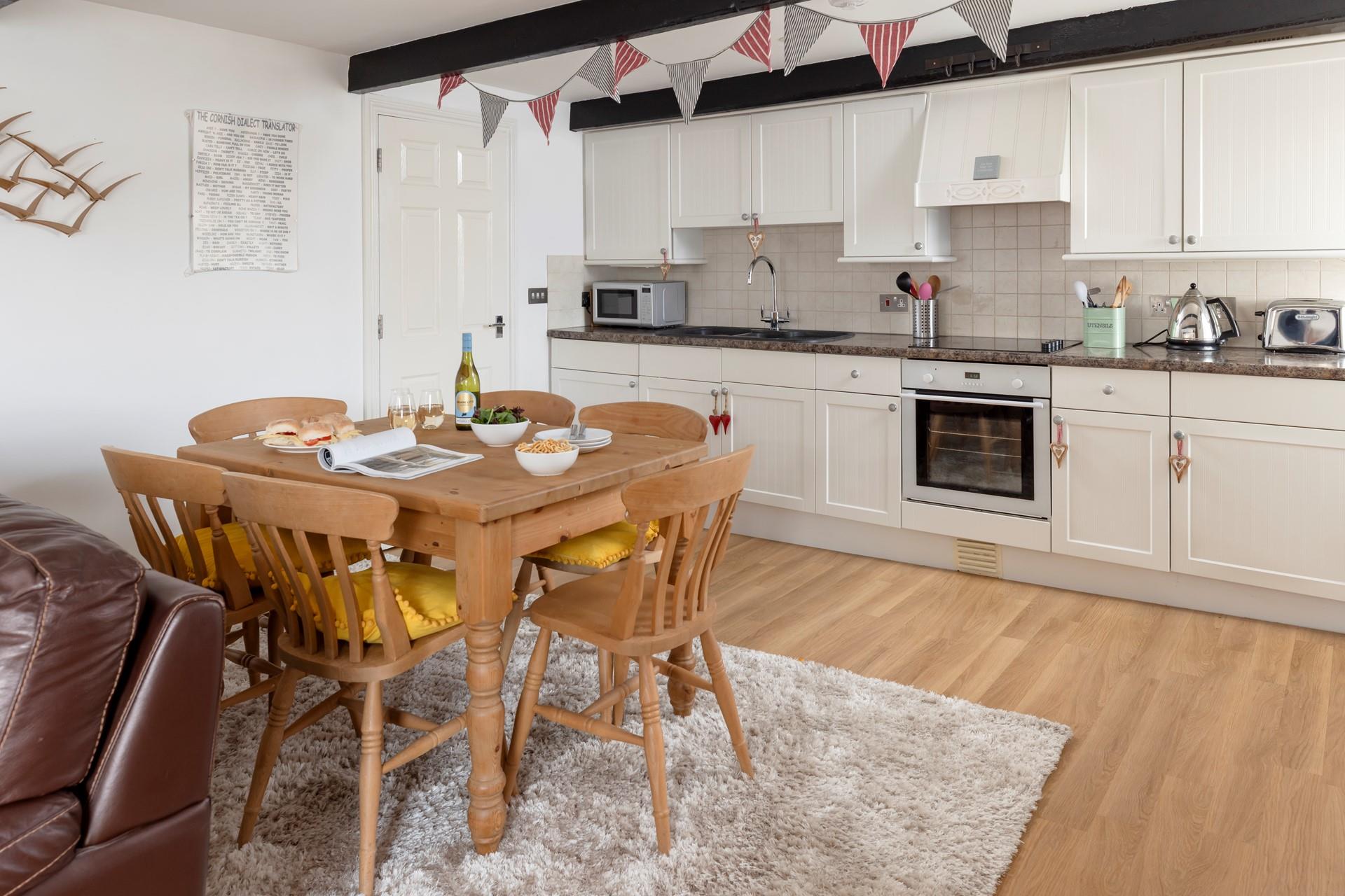 The kitchen is well-equipped for the chef of the family to cook up a storm.