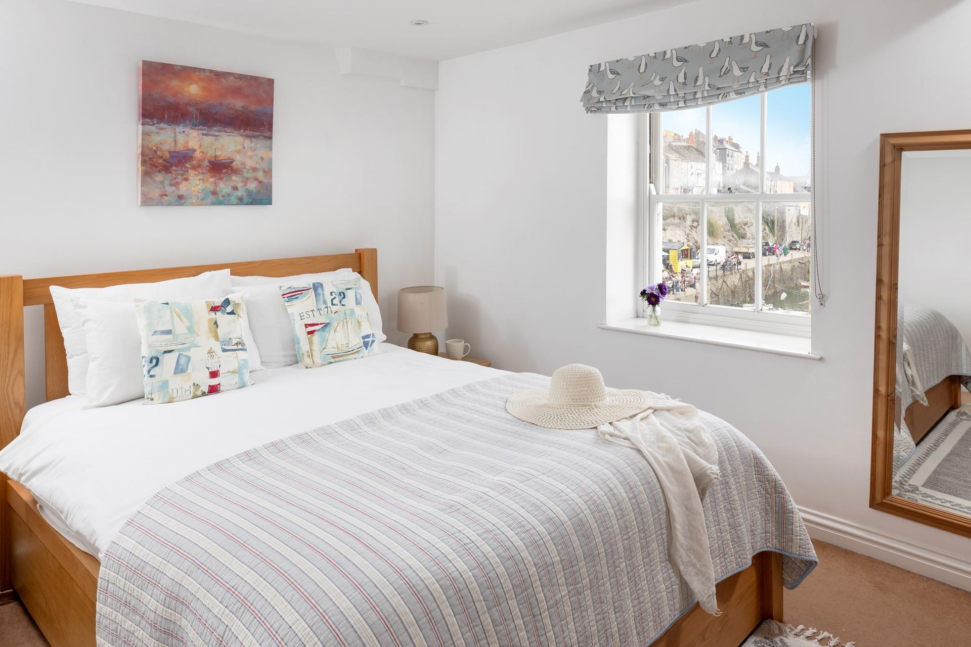 Watch the sunrise over the harbour when you wake.