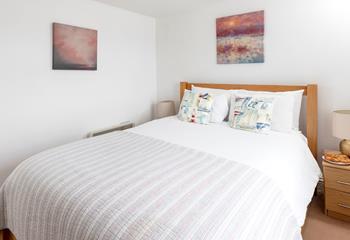 Bedroom 2 is bright and colourful, wake up to views of the harbour while you sip your morning cuppa.