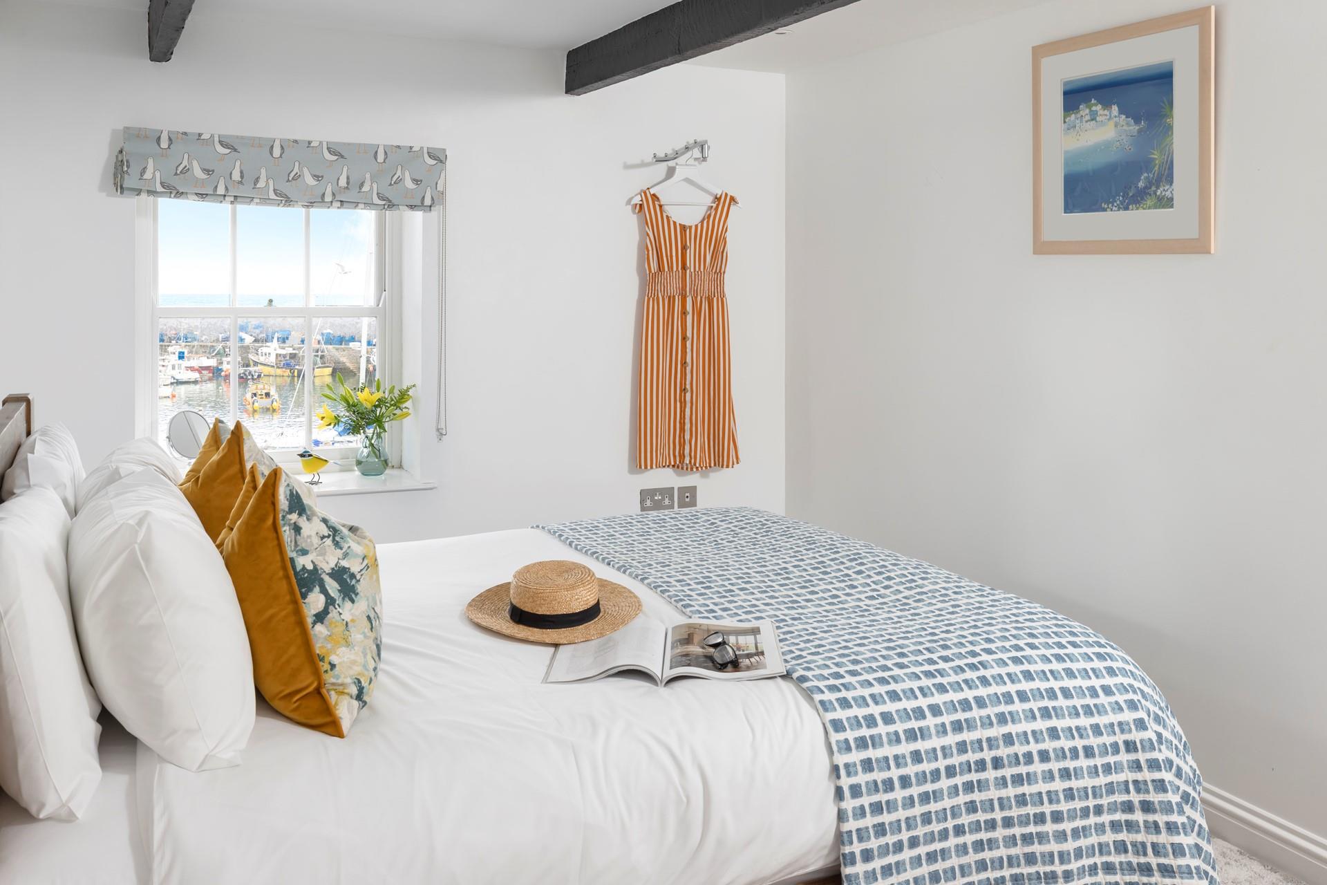 Bedroom 1 has a spacious king size bed to cosy into each night.