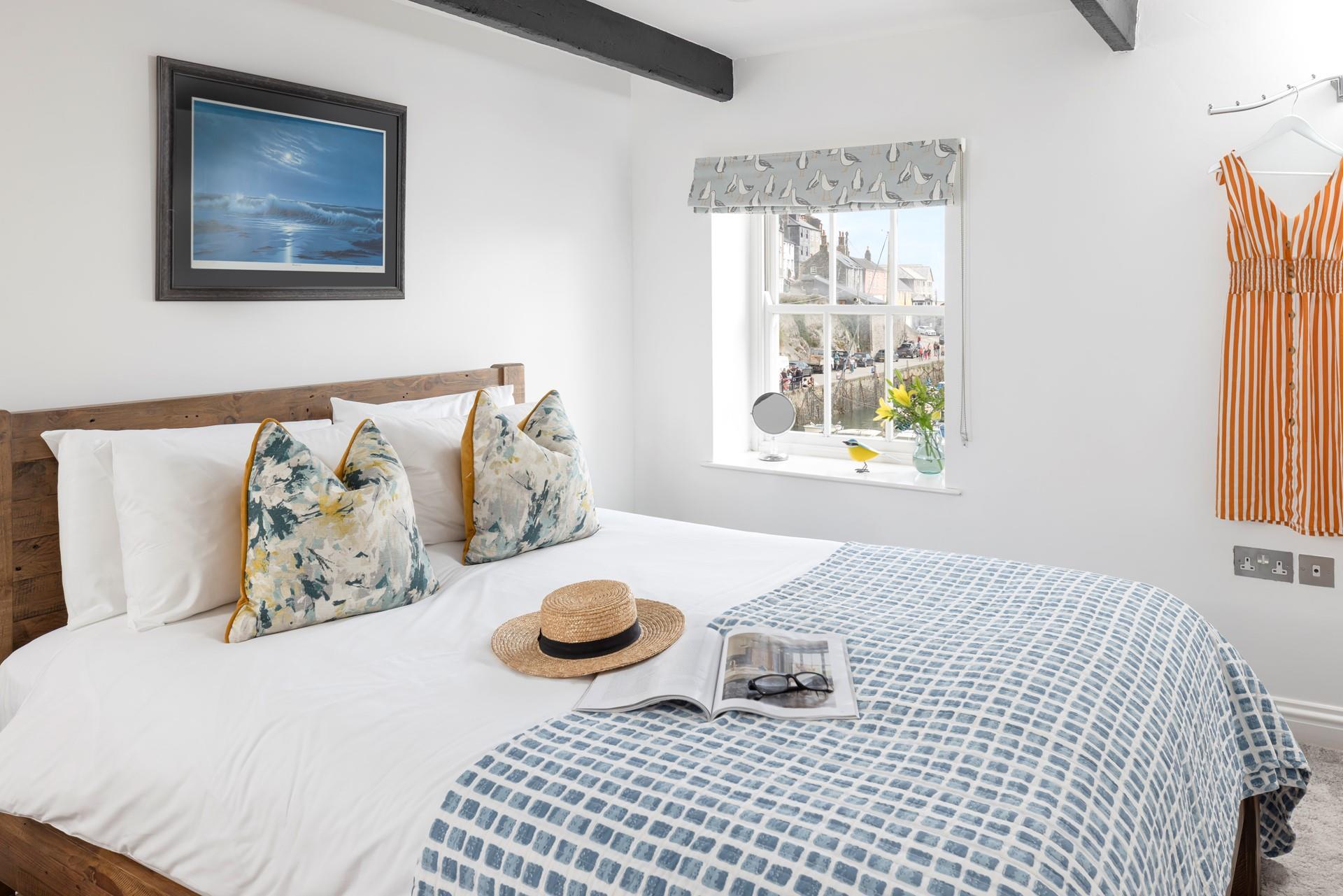 Bedroom 1 has a spacious king size bed to cosy into each night.