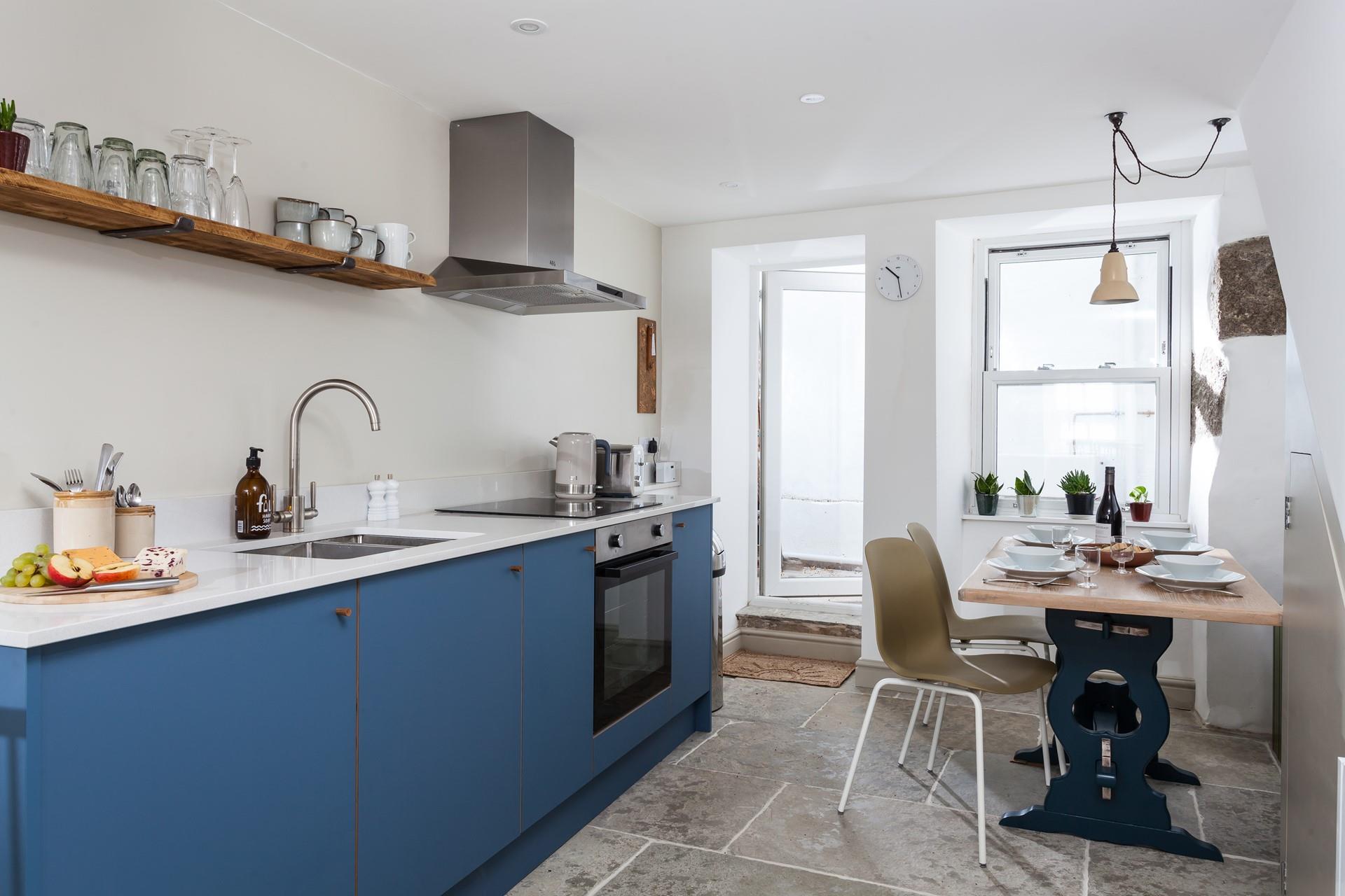 The modern kitchen is well-equipped for all your culinary needs.