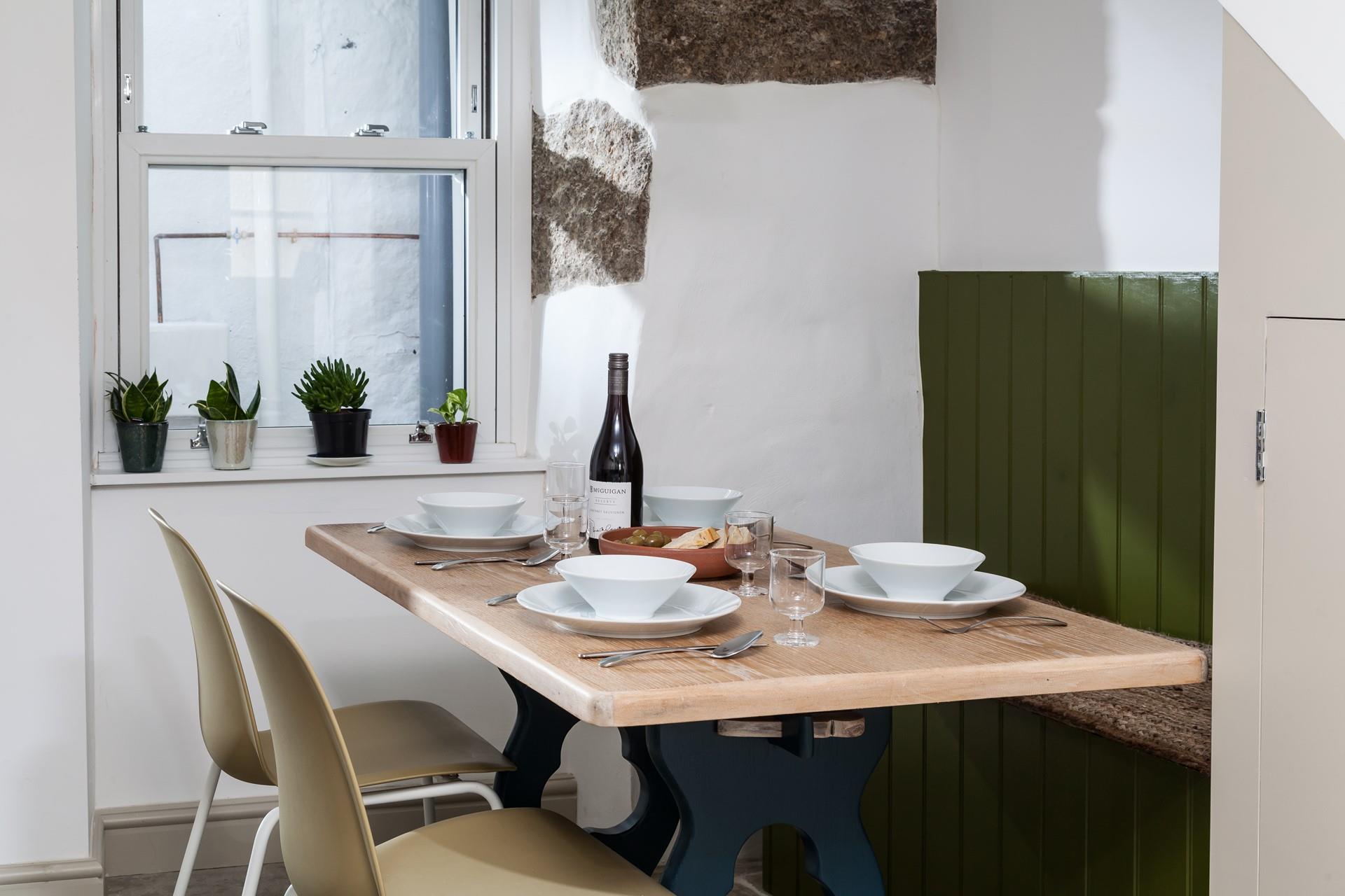 Sit around the dining table and enjoy your favourite meal together chatting about the day.