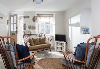 This charming sitting room provides you with a place to relax and unwind after a day exploring St Ives' quaint streets.