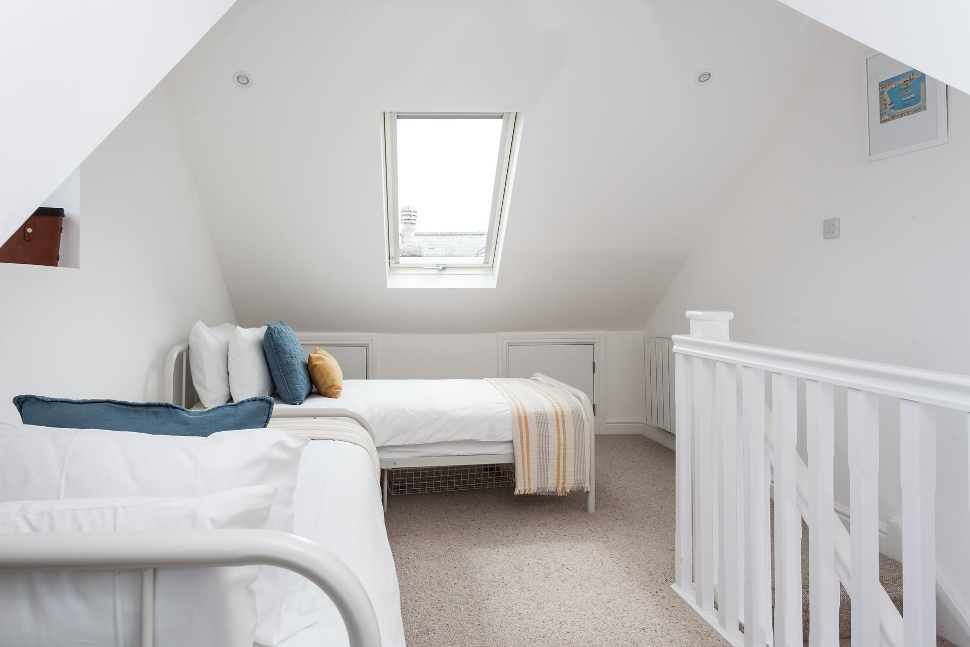 The twin beds are perfect for children or adults to enjoy a peaceful night's sleep.