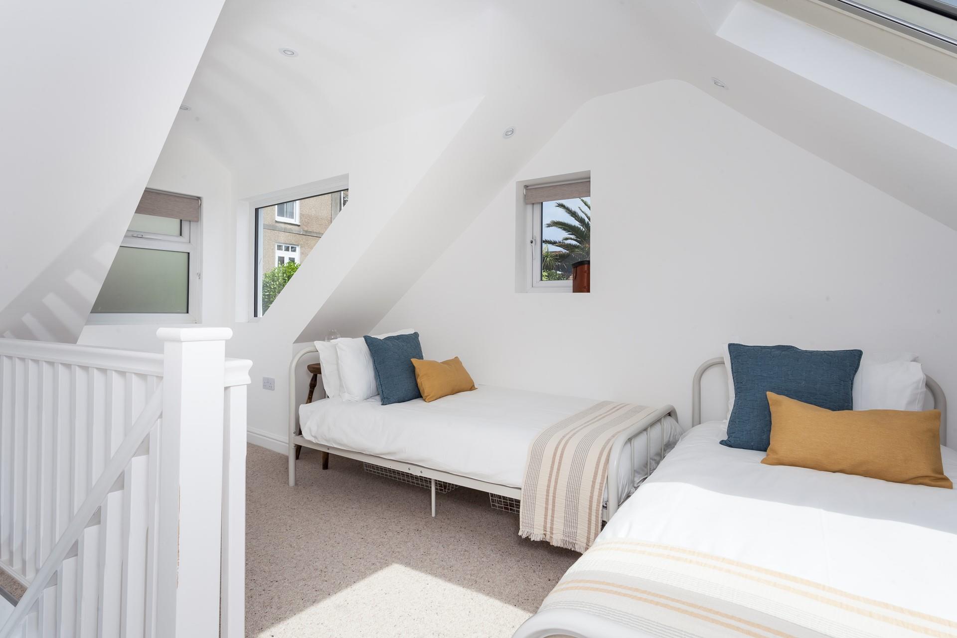 Bedroom 2 has lovely sea views across to Godrevy Lighthouse.