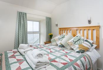 Bedroom 2 has sea views to wake up to each morning and sip your morning cuppa whilst taking in the views.
