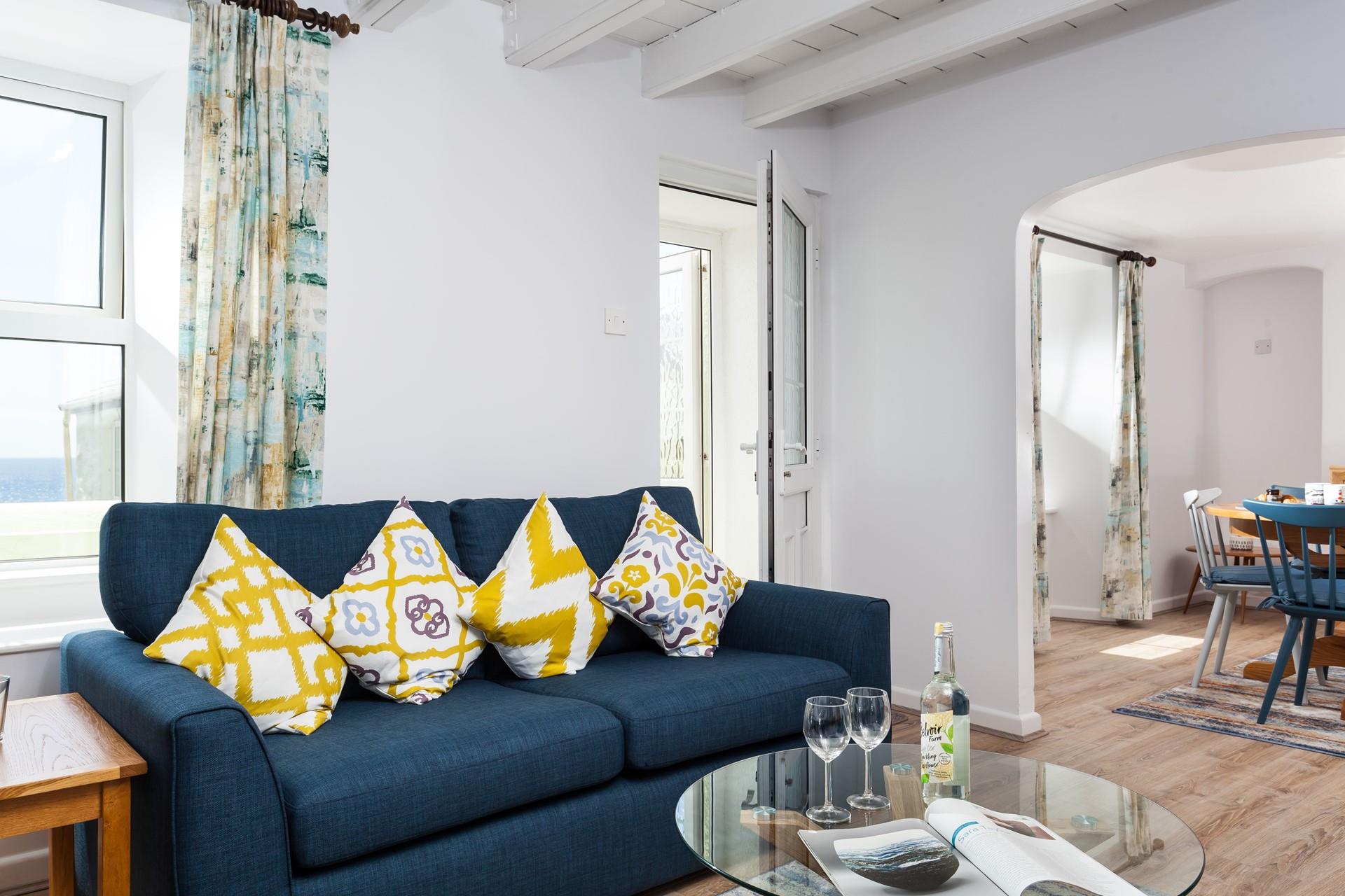 Pour a glass of wine and sink into the soft sofa with a good movie on the TV.