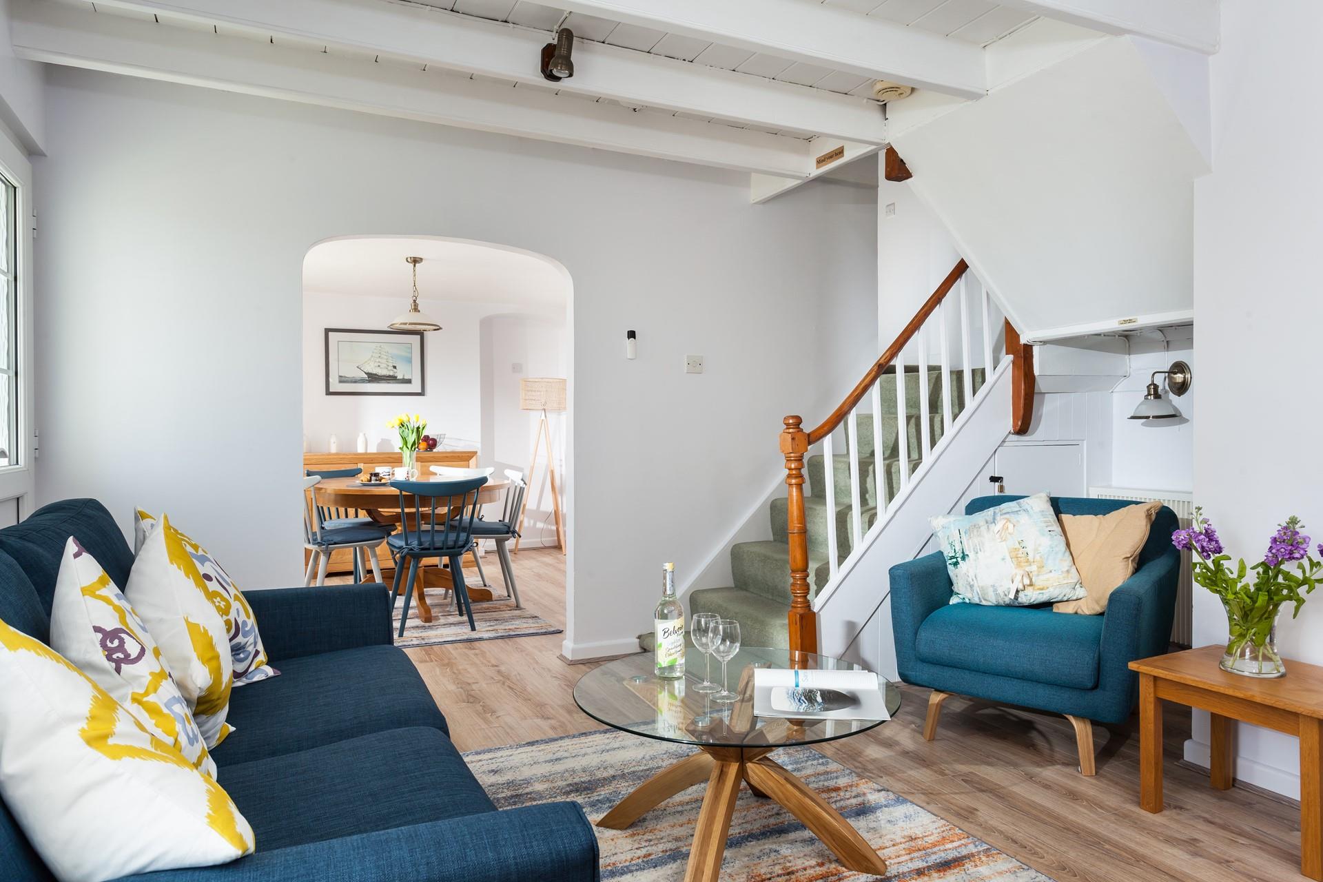 The cosy sitting room offers the perfect base to relax and unwind each evening.