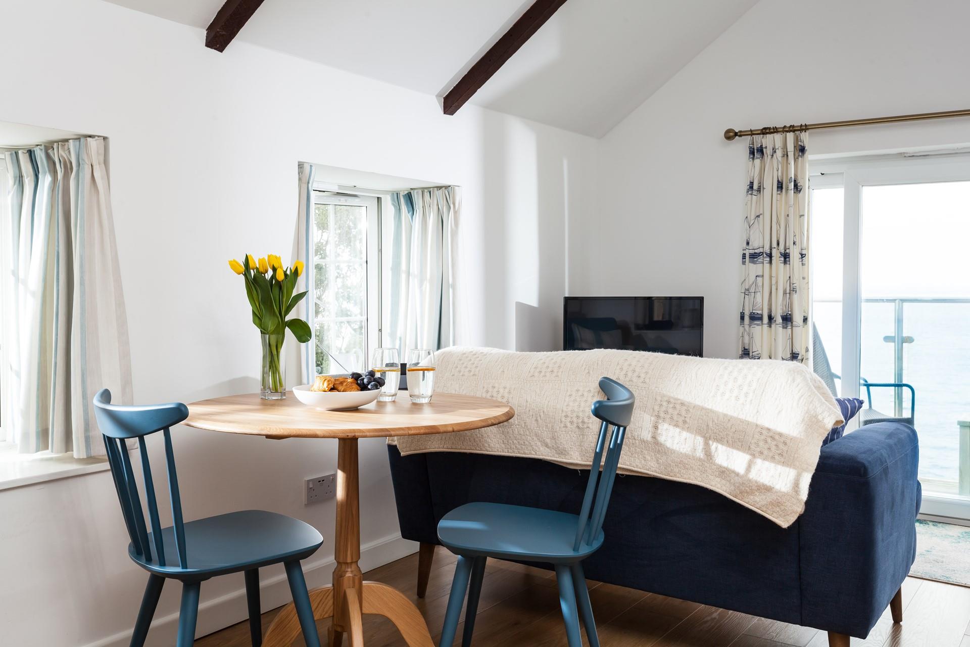 Dine in style with this extendable table for two. 