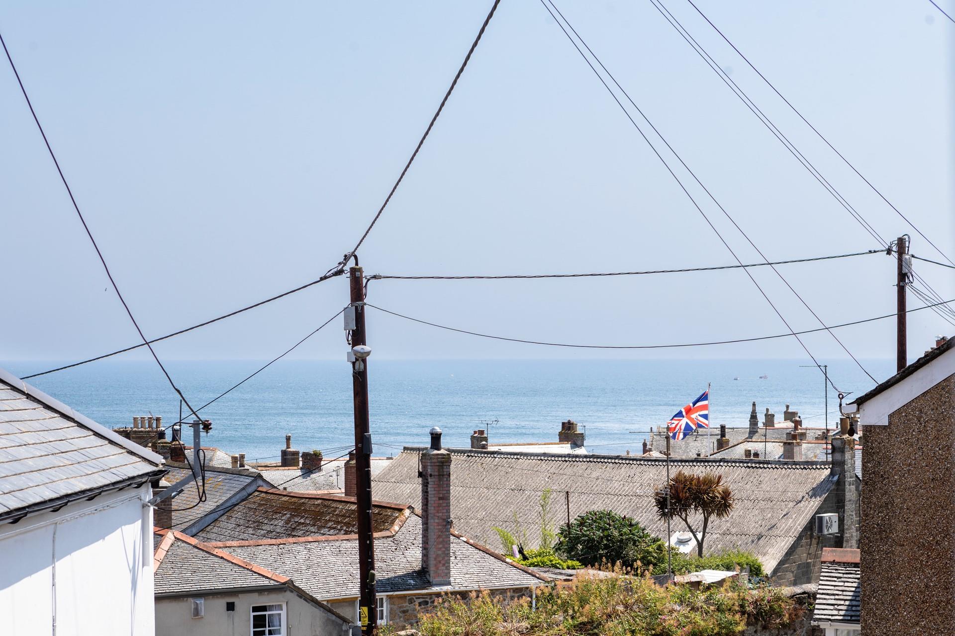Take in the sea views over Mousehole's rooftops.