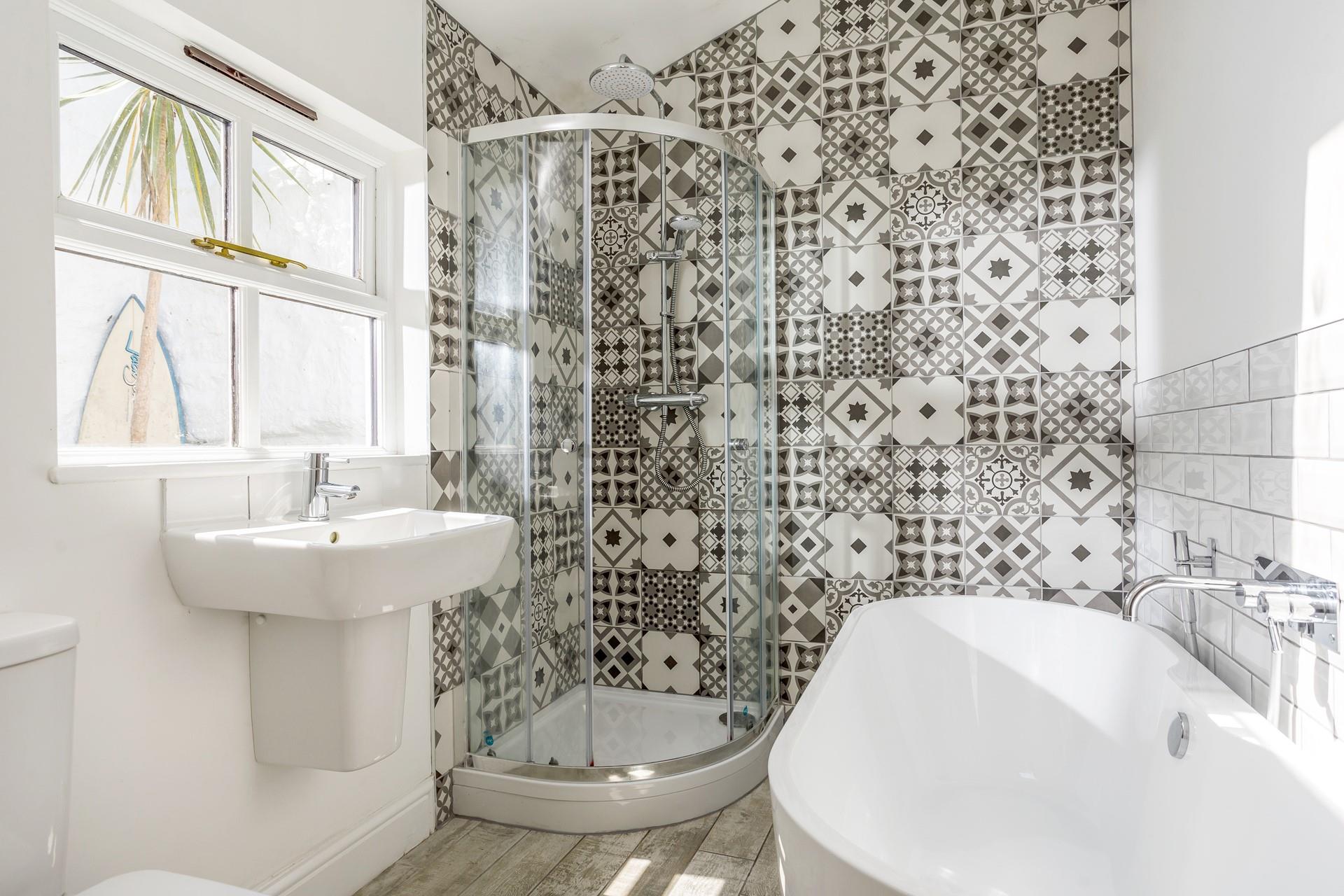 There is the option of an invigorating shower or relaxing bath in the family bathroom.