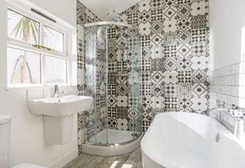 There is the option of an invigorating shower or relaxing bath in the family bathroom.