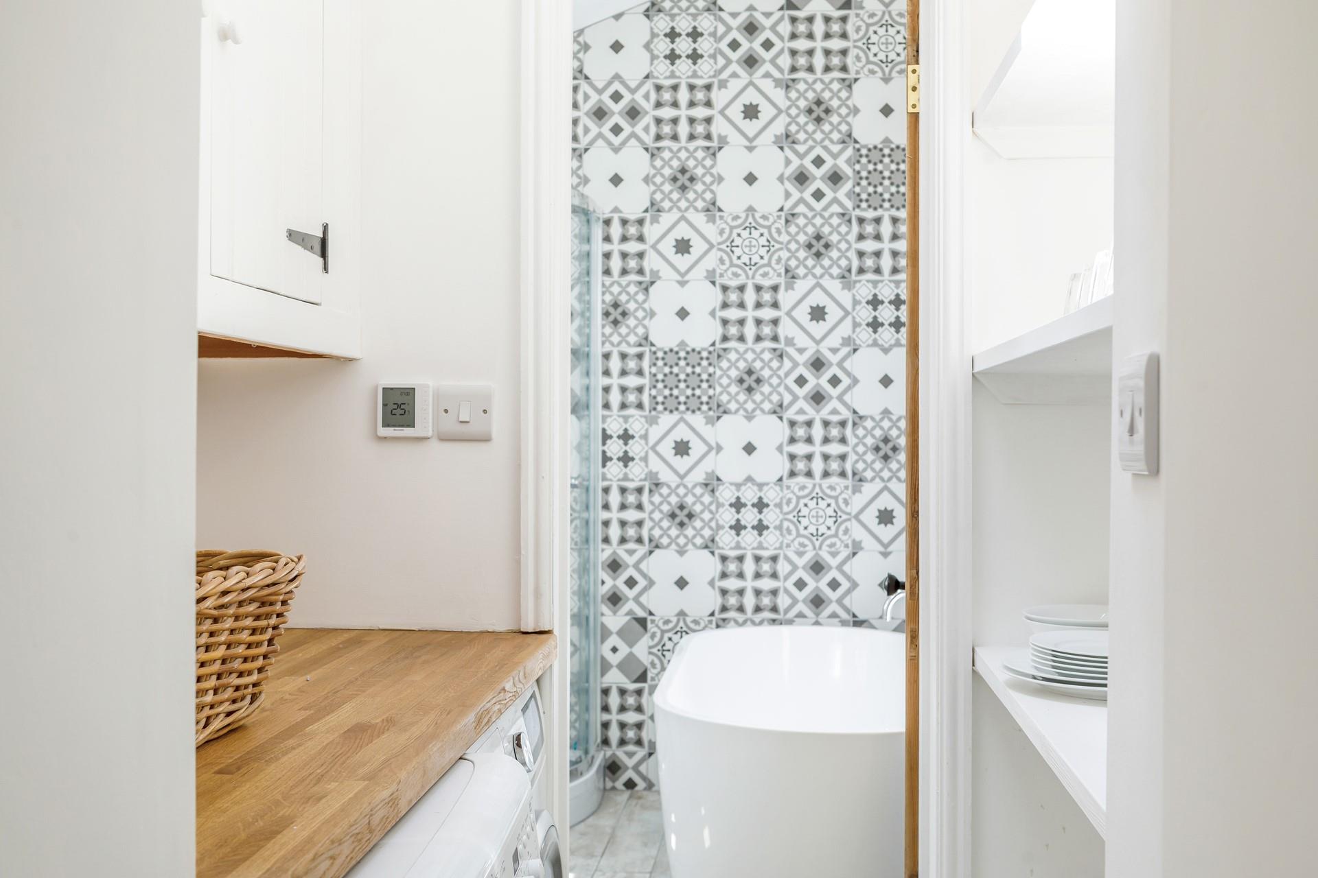 After a coast path ramble, come back to soak in the free-standing bath.