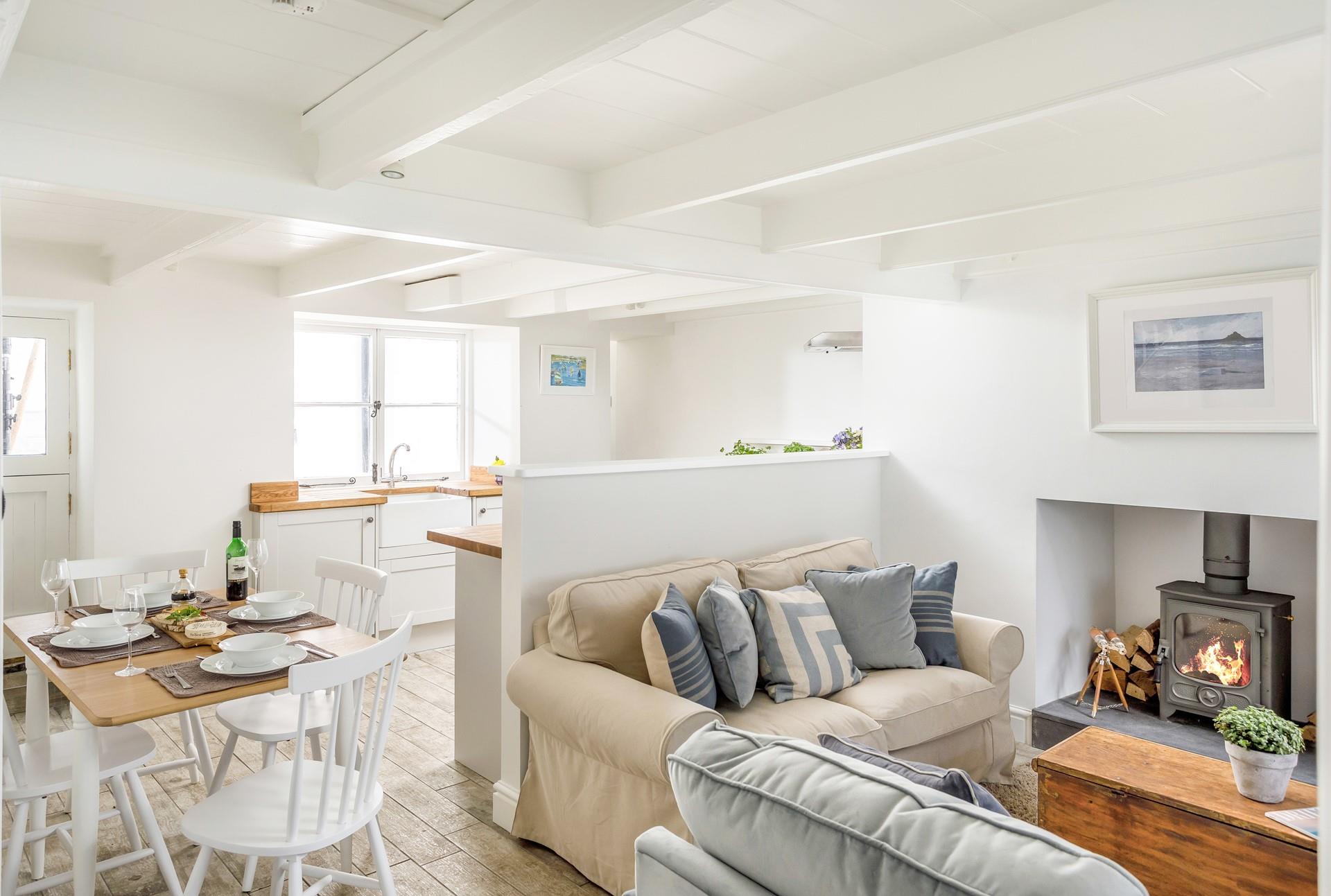 Open plan living means you can enjoy the warmth of the woodburner whilst cooking and dining too.