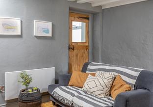 Comfortable furnishings and subtle artwork create a calming space to relax in.