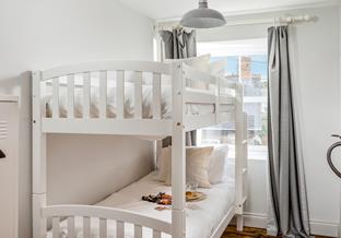 A comfortable, cosy bunk bedroom is ideal for the children of the family.