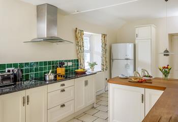 The kitchen is fully equipped with plenty of worktop space to cook up a feast.