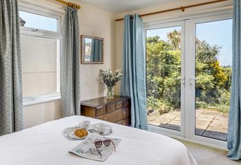 Bedroom 3 has far-reaching views across the Bay to wake up to.