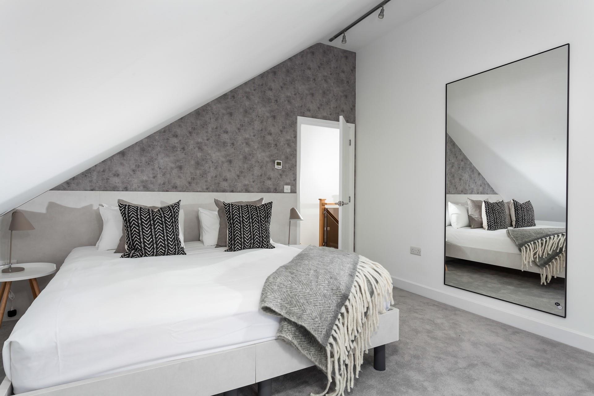 Bedroom 3 also has zip and link beds and a large mirror for getting ready.