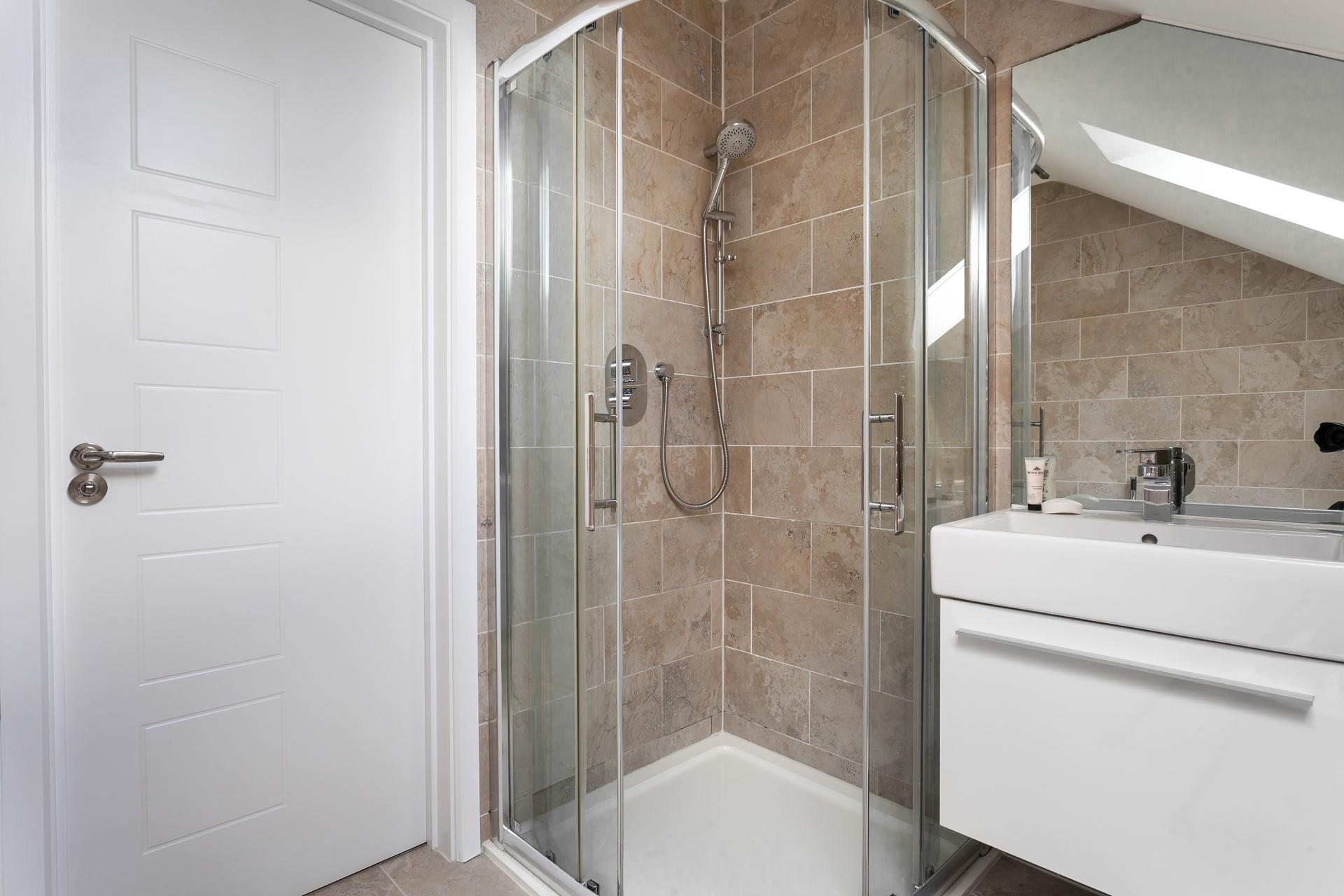 Wash off your sandy toes in the shower after a day on the beach.