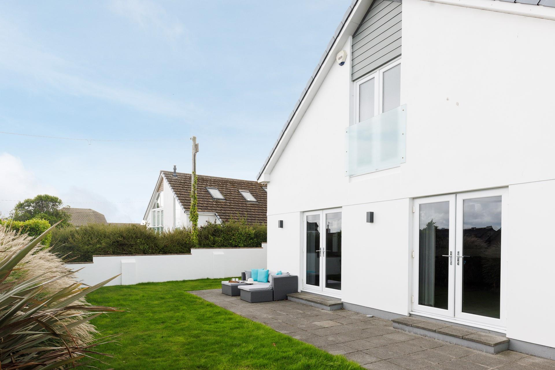 The large garden is ideal for little ones to play.