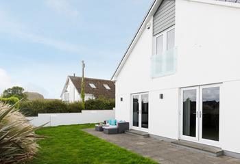 The large garden is ideal for little ones to play.