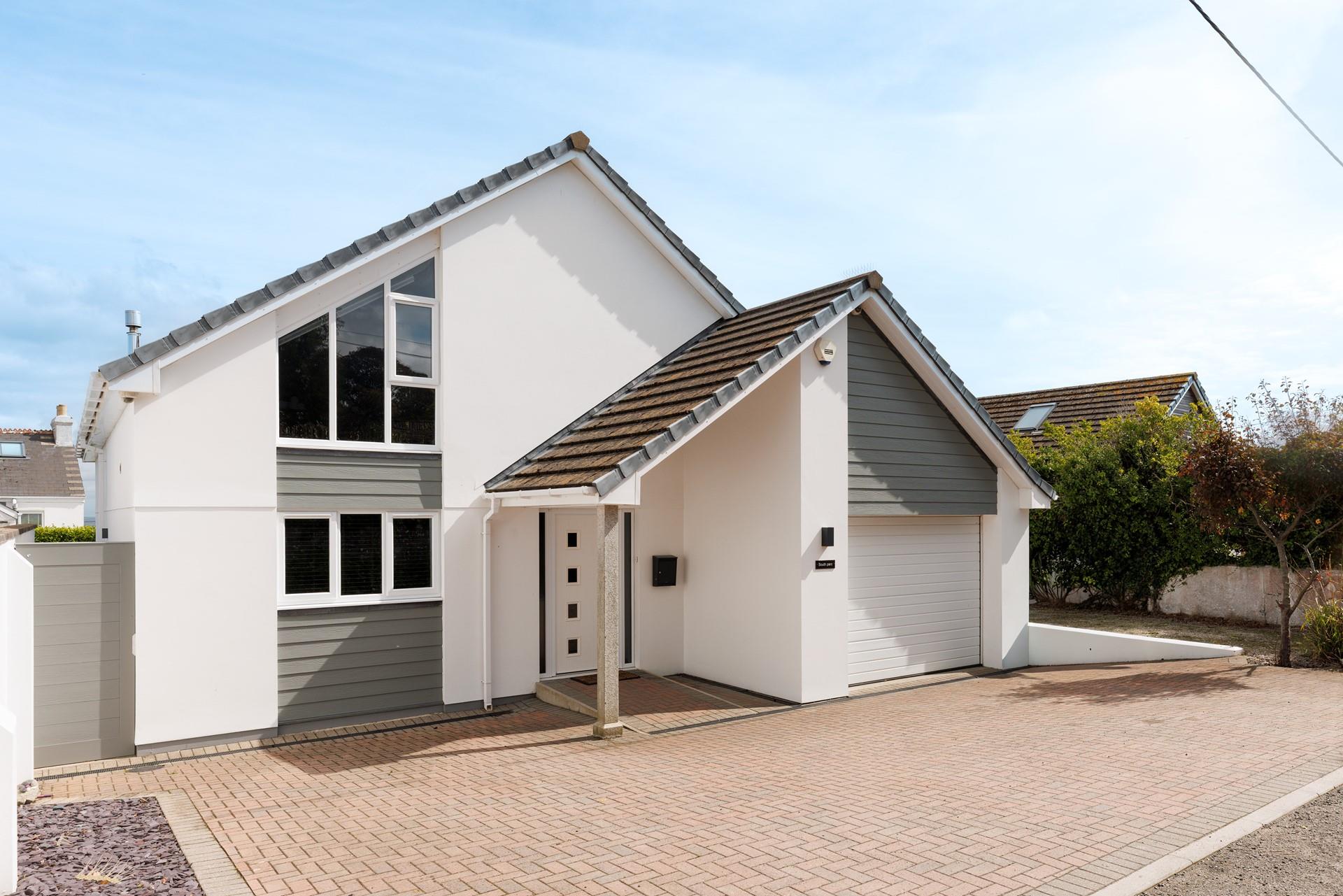 There is ample parking space on the private drive.