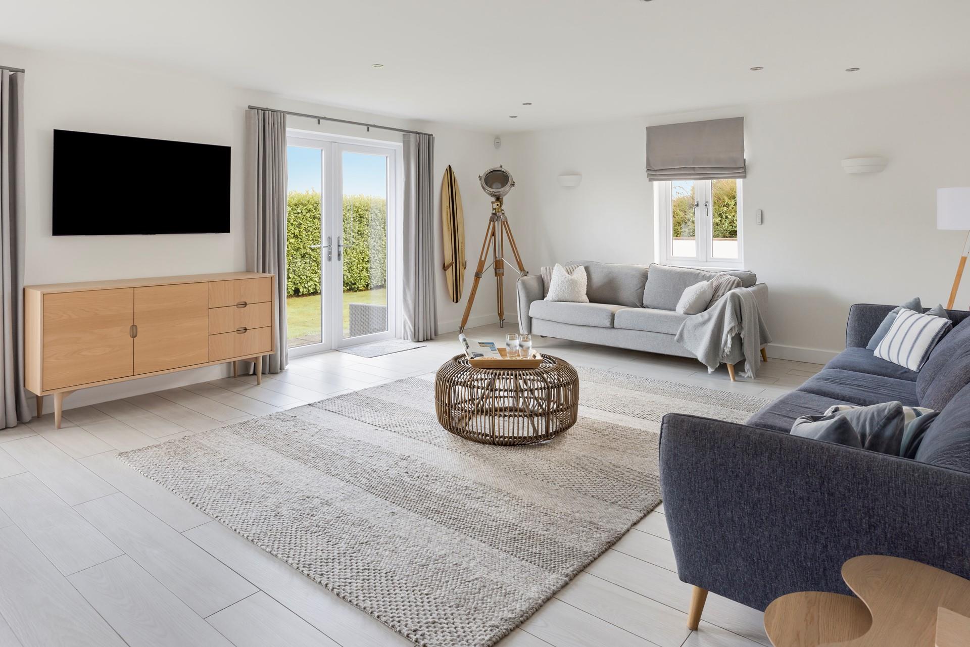 Sink into comfy sofas and enjoy a family movie night after a day on the coast!