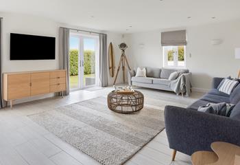 Sink into comfy sofas and enjoy a family movie night after a day on the coast!