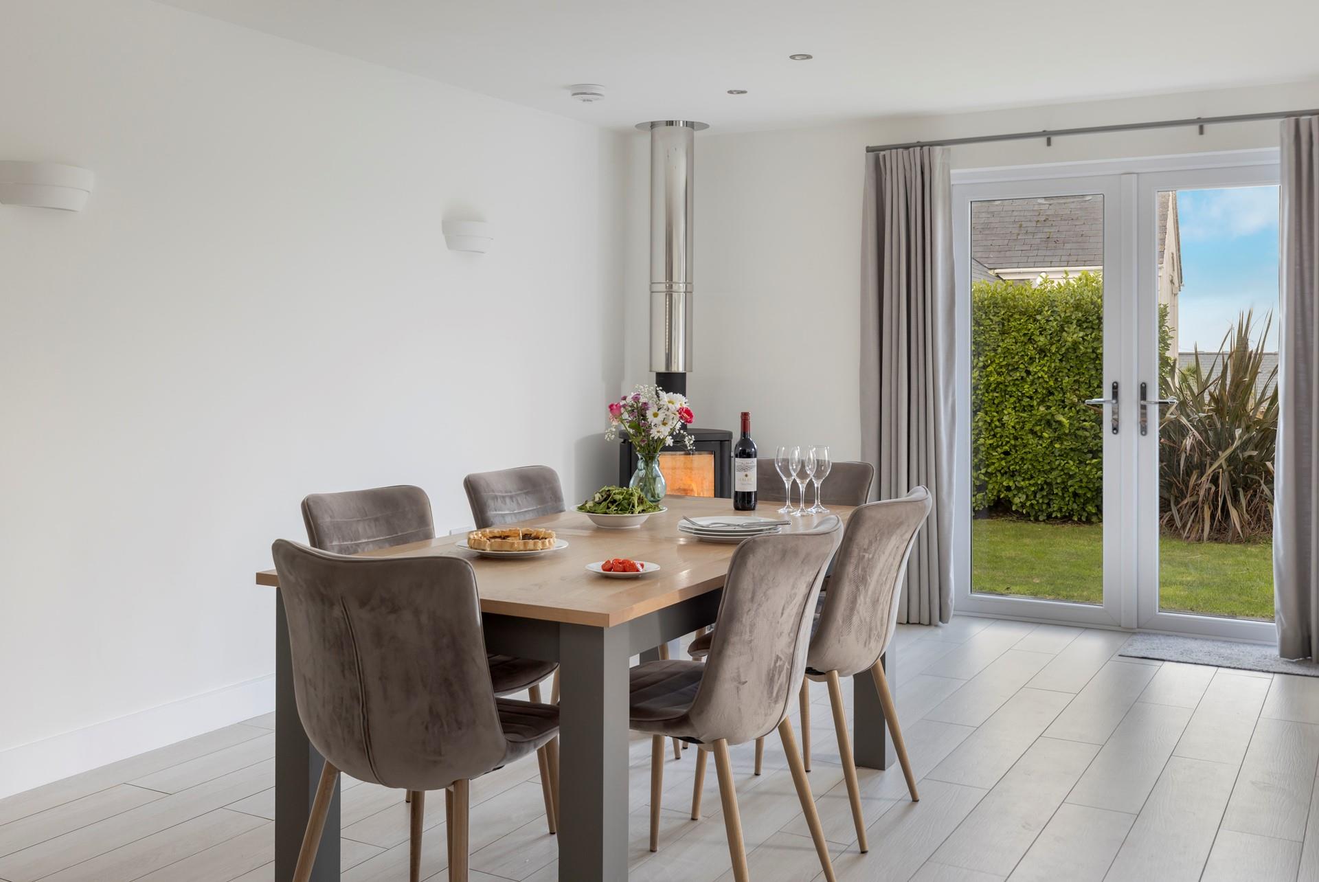 The dining table seats six, perfect for family meals and game nights!