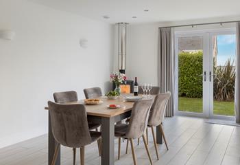 The dining table seats six, perfect for family meals and game nights!