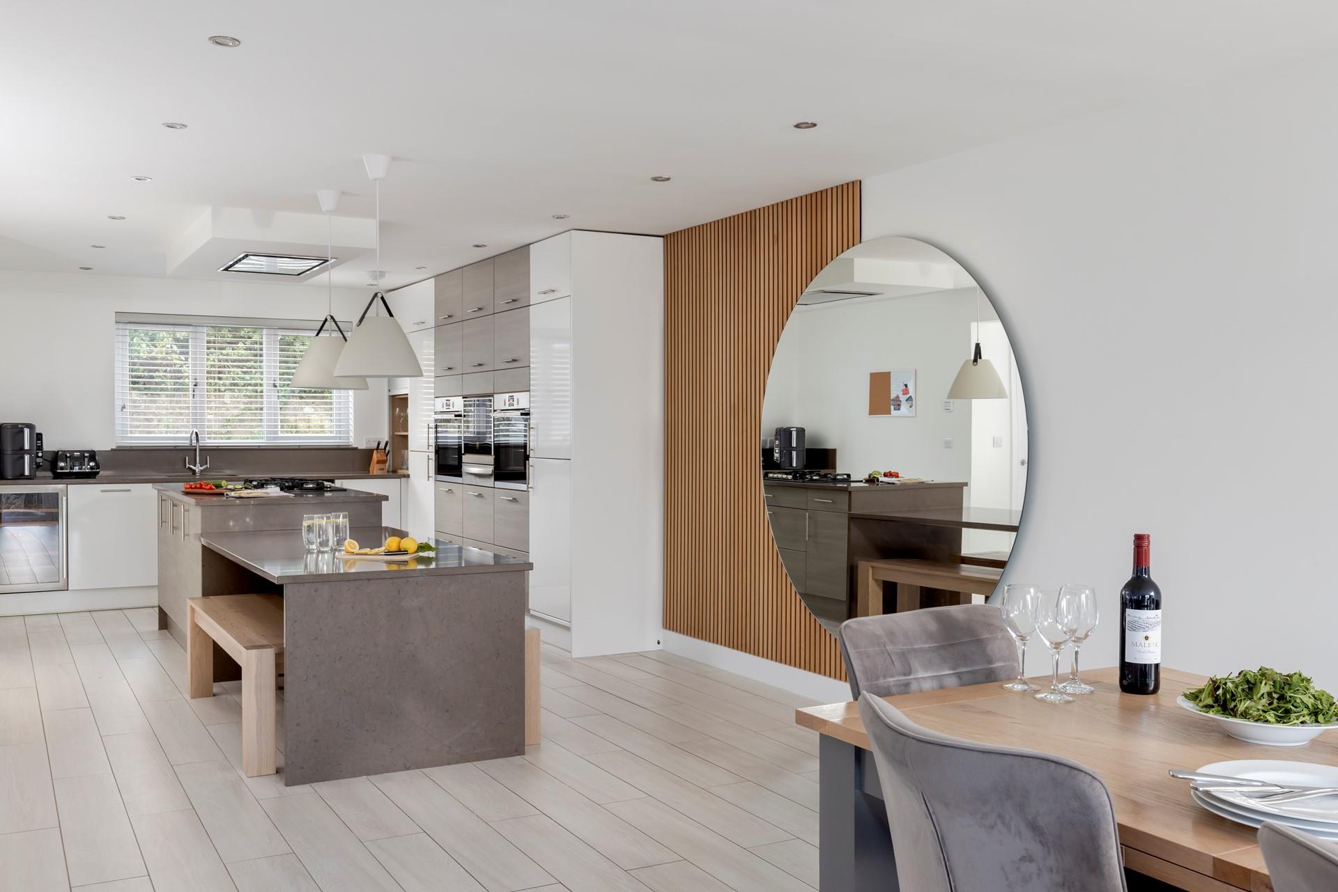 The kitchen is modern and well-equipped for all your culinary needs.