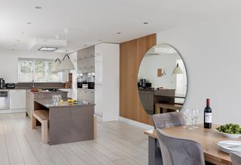 The kitchen is modern and well-equipped for all your culinary needs.