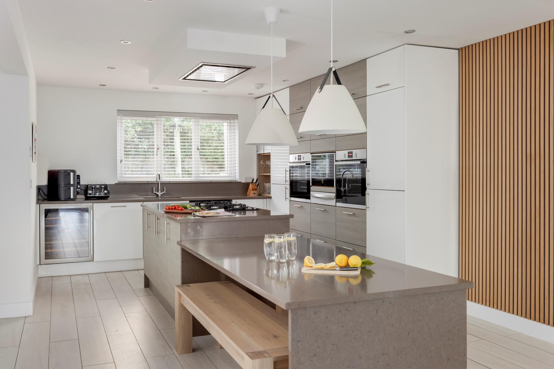 There's a spacious island, dual ovens, and a wine cooler!