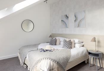 Contemporary art and furnishings invite you to relax in luxury.