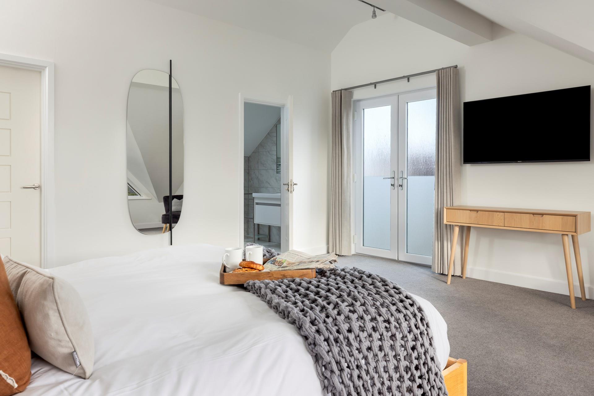 Enjoy a sea view from the juliet balcony.