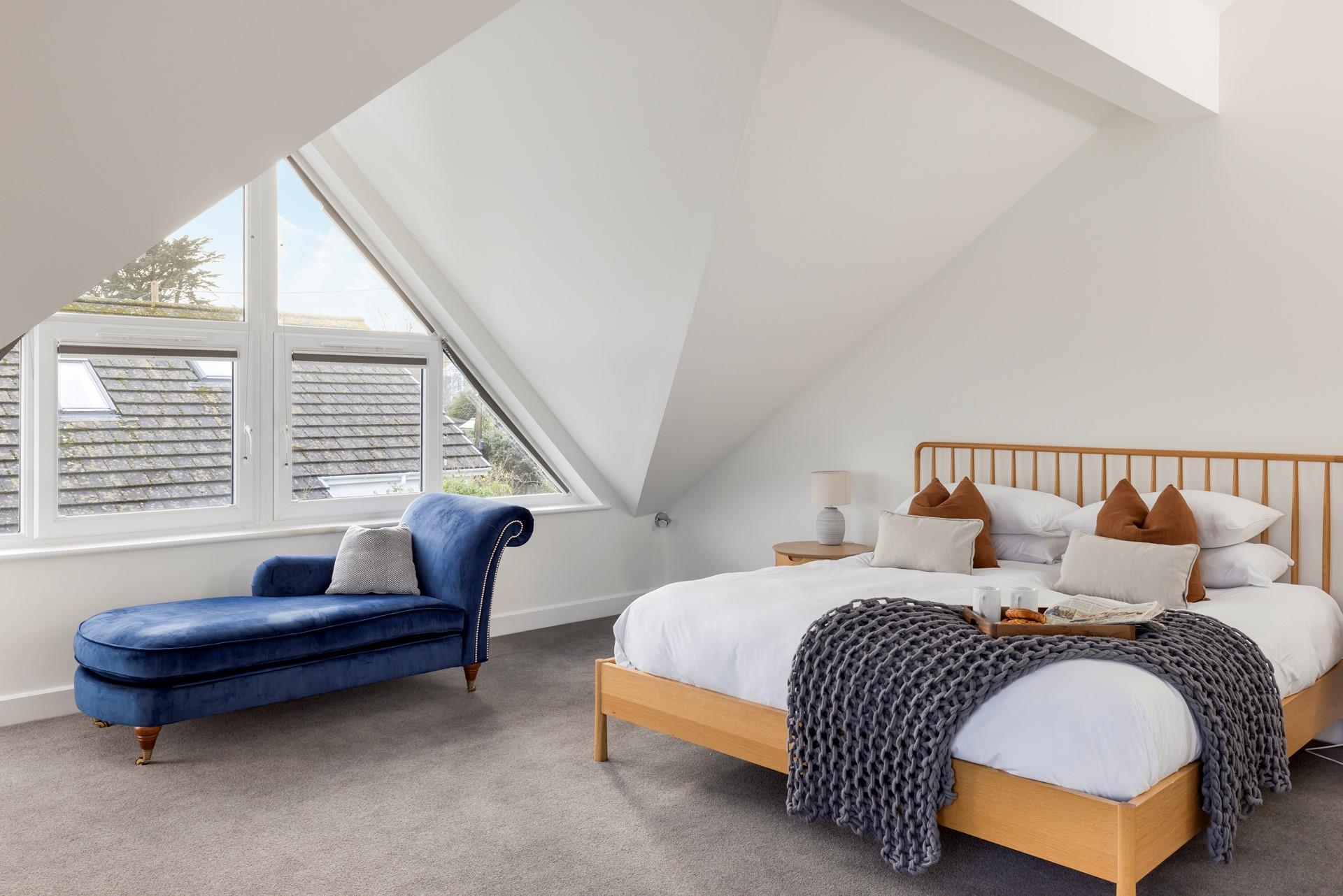 Spend slow mornings sipping coffee in bed before exploring the nearby coastal path.