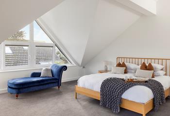 Spend slow mornings sipping coffee in bed before exploring the nearby coastal path.