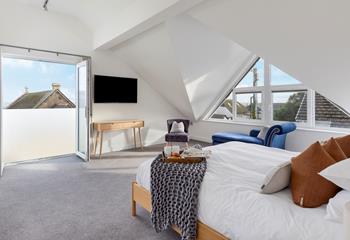 Bedroom 1 exudes luxury with the spacious super king size bed offering a peaceful night's sleep.