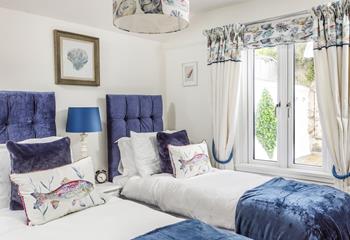 Bedroom 2 has zip and link beds and is ideal for children or adults to enjoy a restful night's slumber.